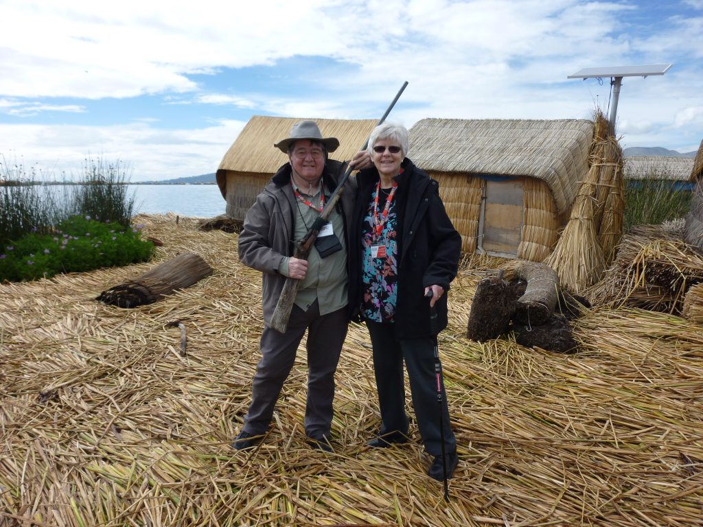 John and Janet on man made island on Lake Titicaca